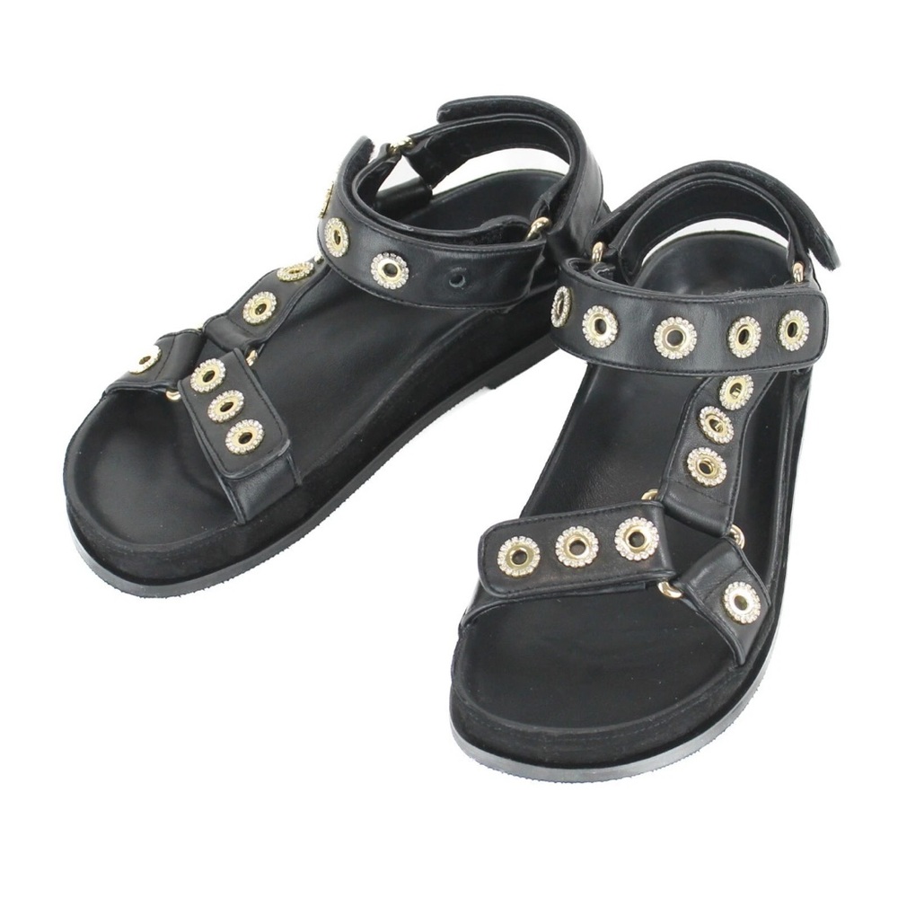 Sandro Black and Gold Slide Sandals with Minimalist Design